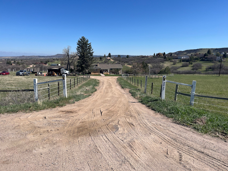 dirt driveway before installing new asphalt driveway