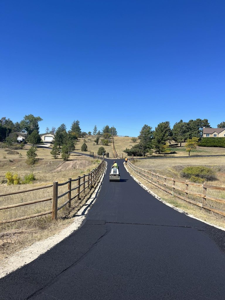 long driveway being paved