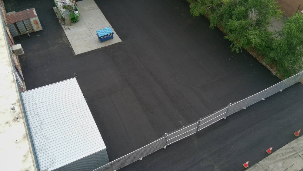 Areal view of asphalt parking lto in Denver