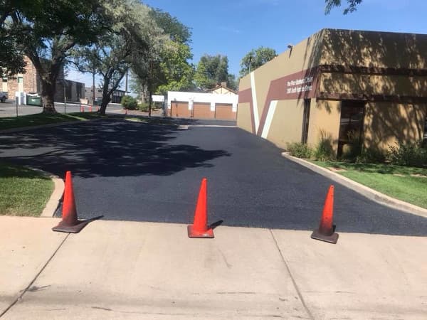 small office park parking lot with new sealcoating