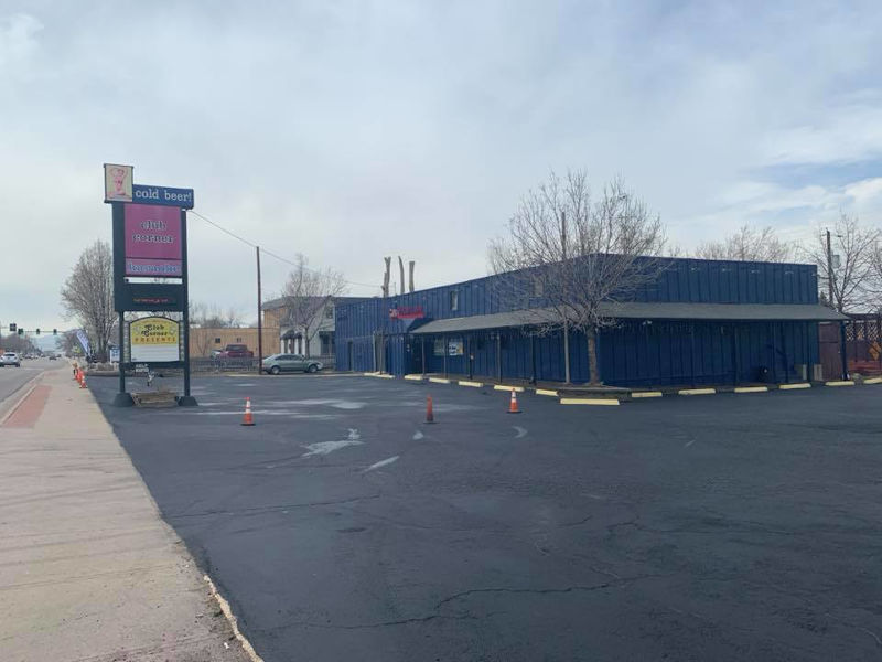 retail parking lot with asphalt maintenance completed