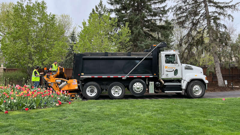 asphalt truck with paver