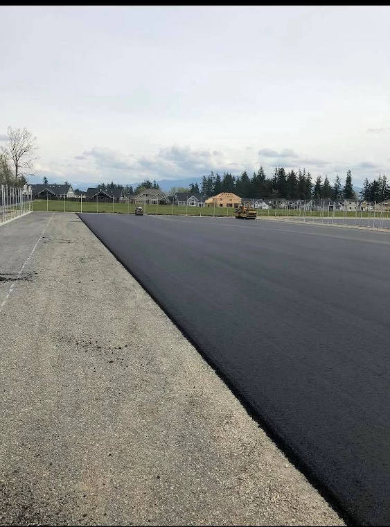 School parking lot being paved